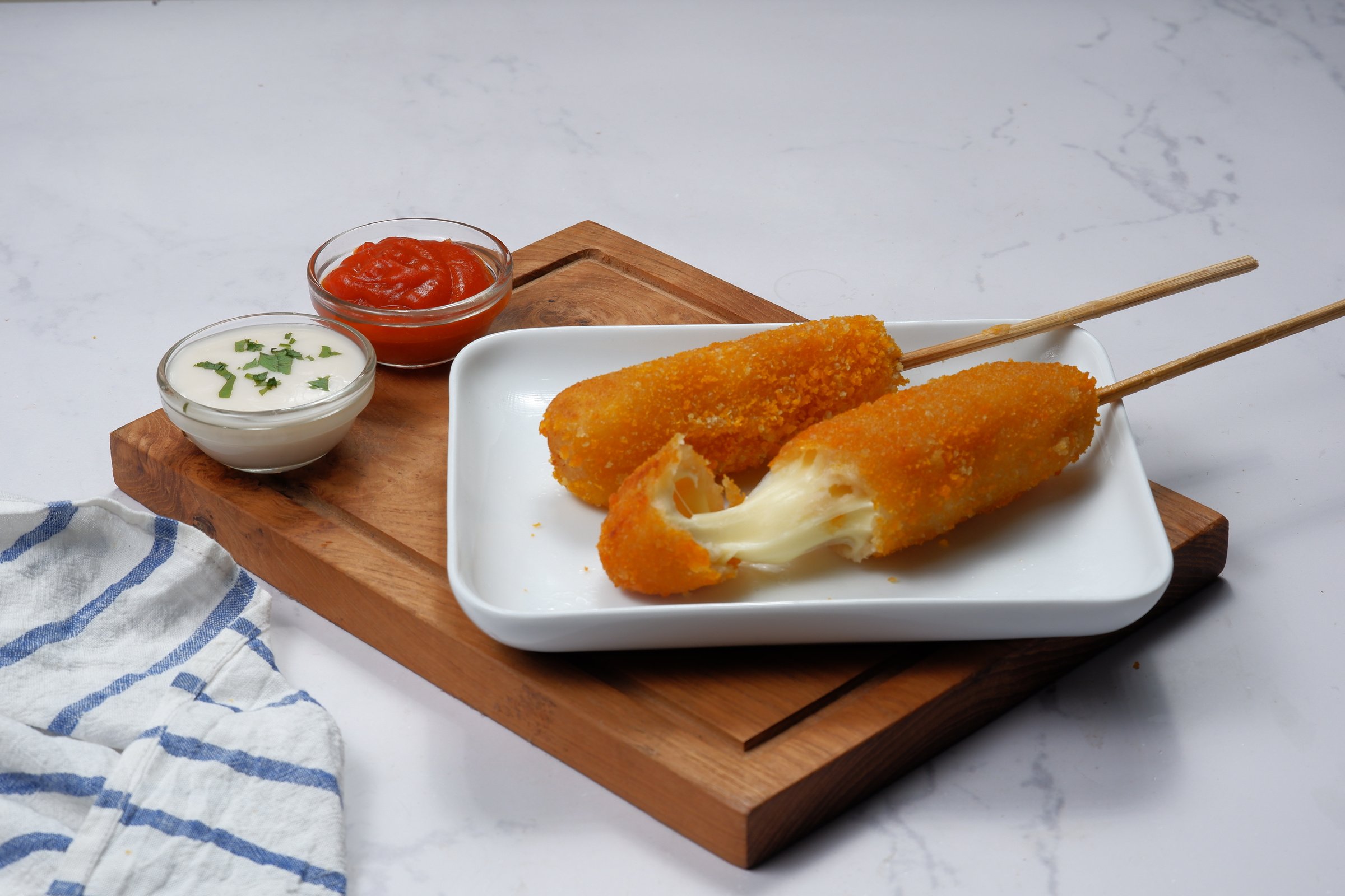 Korean Style Corn Dog with ketchup and mayonnaise